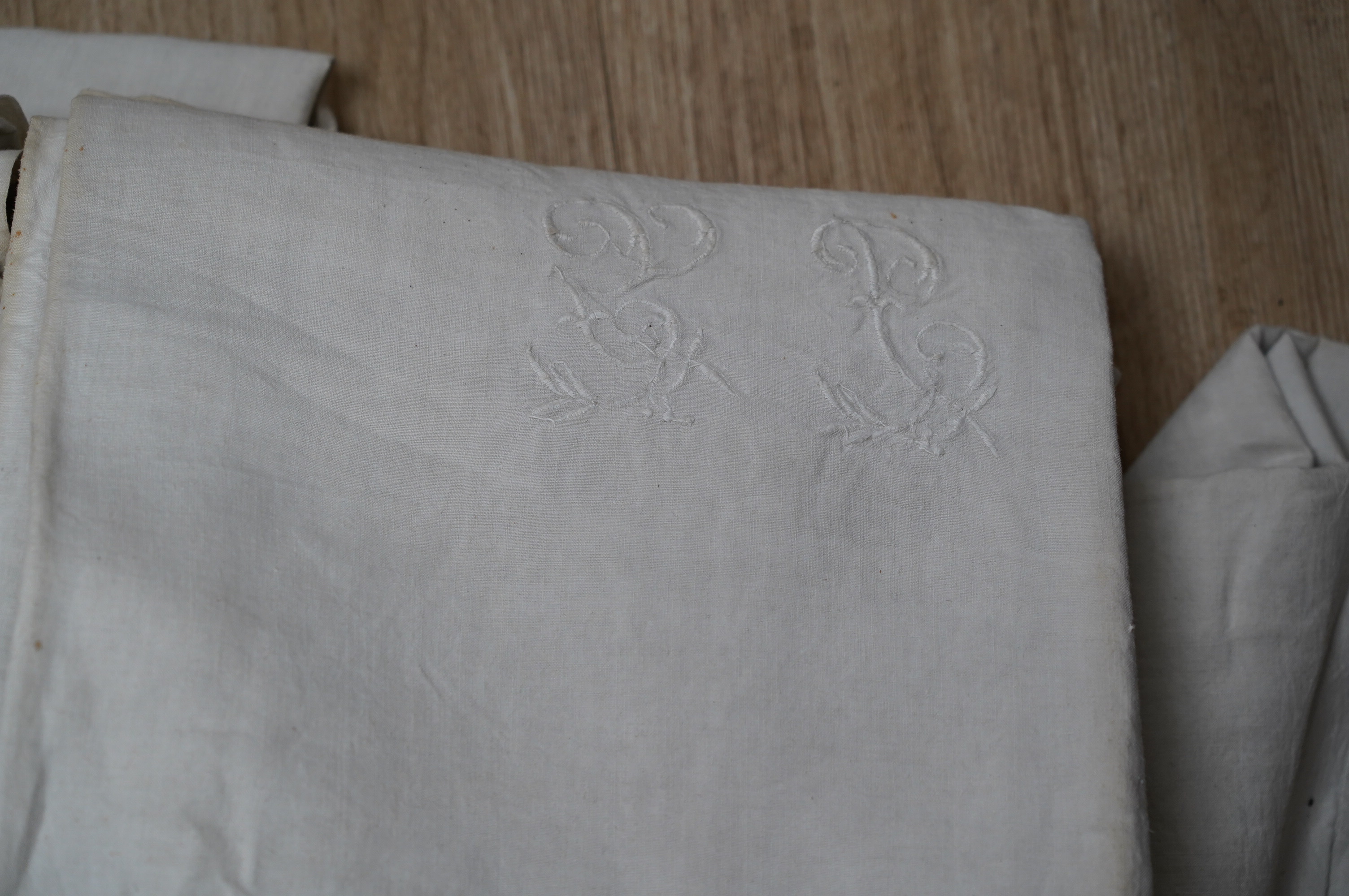 Nine French provincial linen sheets, some monogrammed